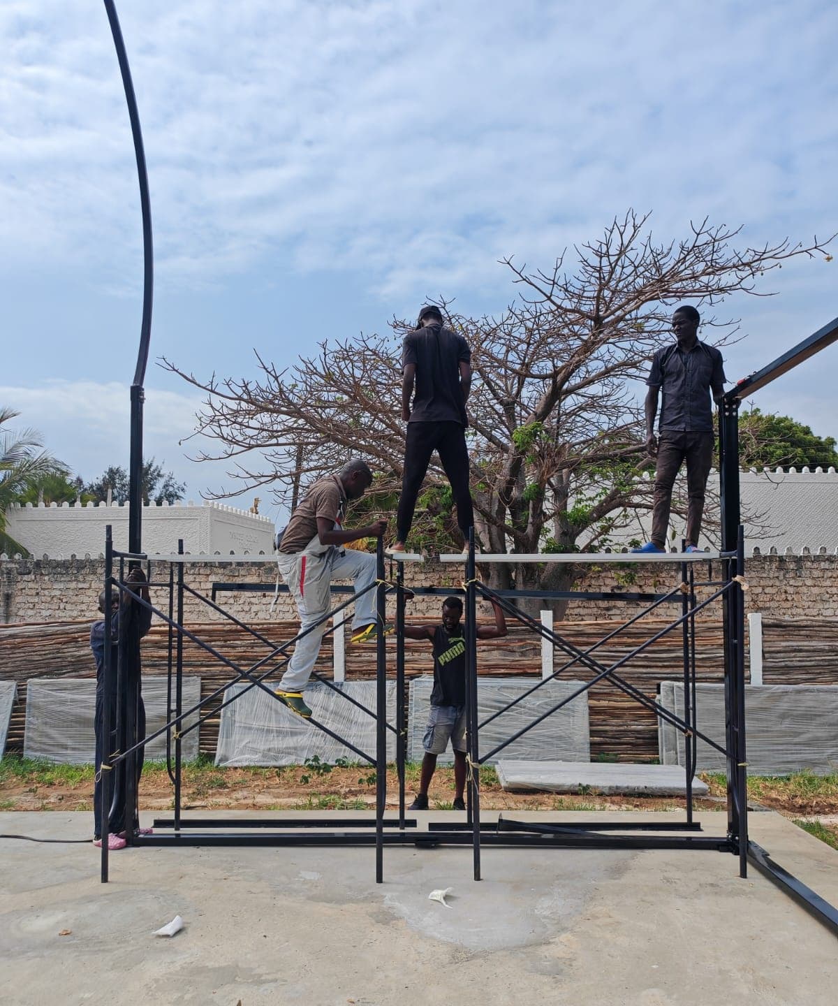 Building the steel frame, piece by piece.